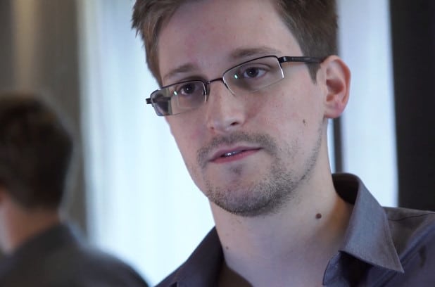 In this handout photo provided by The Guardian, Edward Snowden speaks during an interview in Hong Kong. 